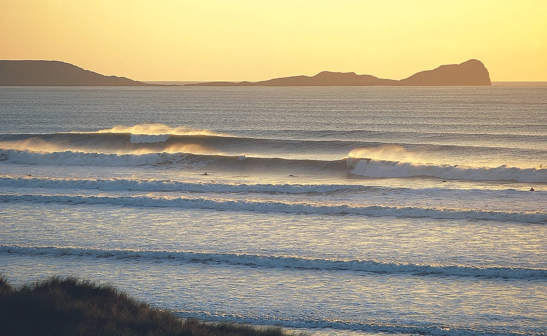 Llangennith with Worms Head in the Background by Phil Holden