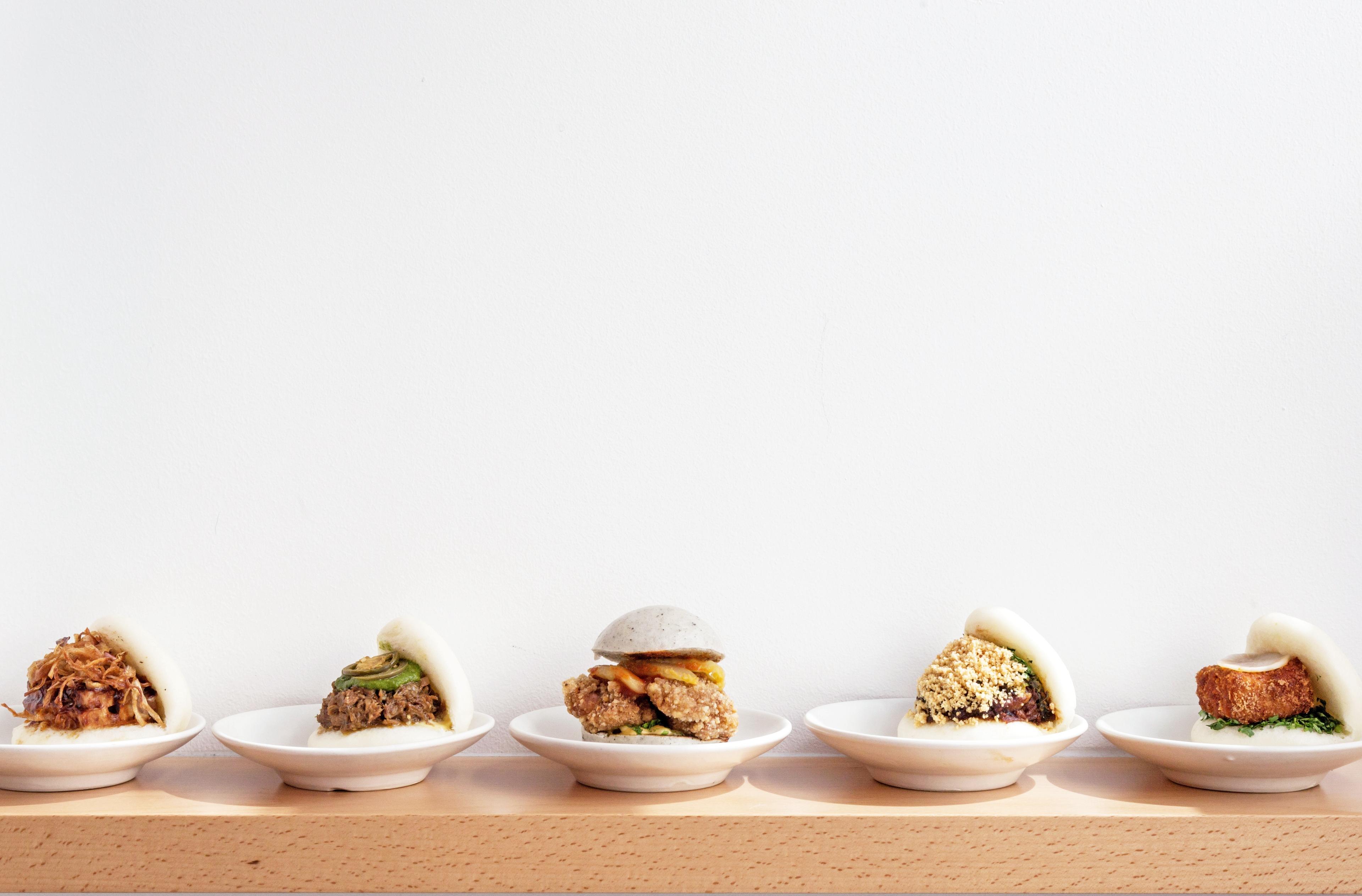 Pork steamed bao, lamb steamed bao, fried chicken steamed bao, daikon steamed bao at bao london