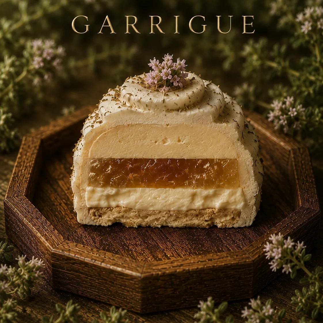 Cross-section of Garrigue · one bite — French meringue sandwich on thyme honey with sheep-yogurt crémeux and quince.