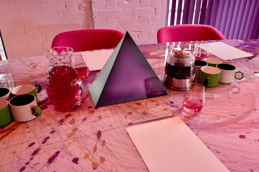 View of a pyramid table center piece with refreshments side by side