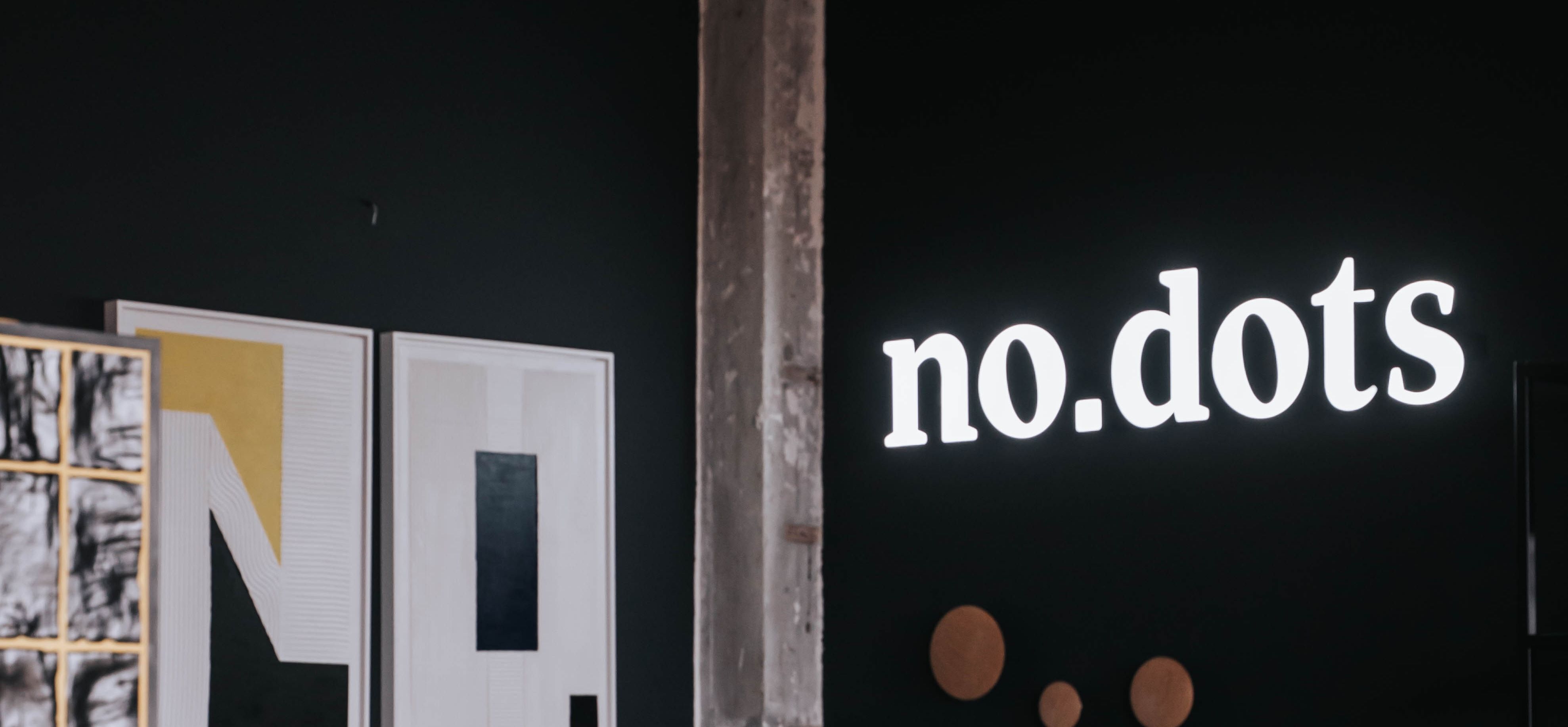Sfeerfoto van kantoor met no.dots logo
