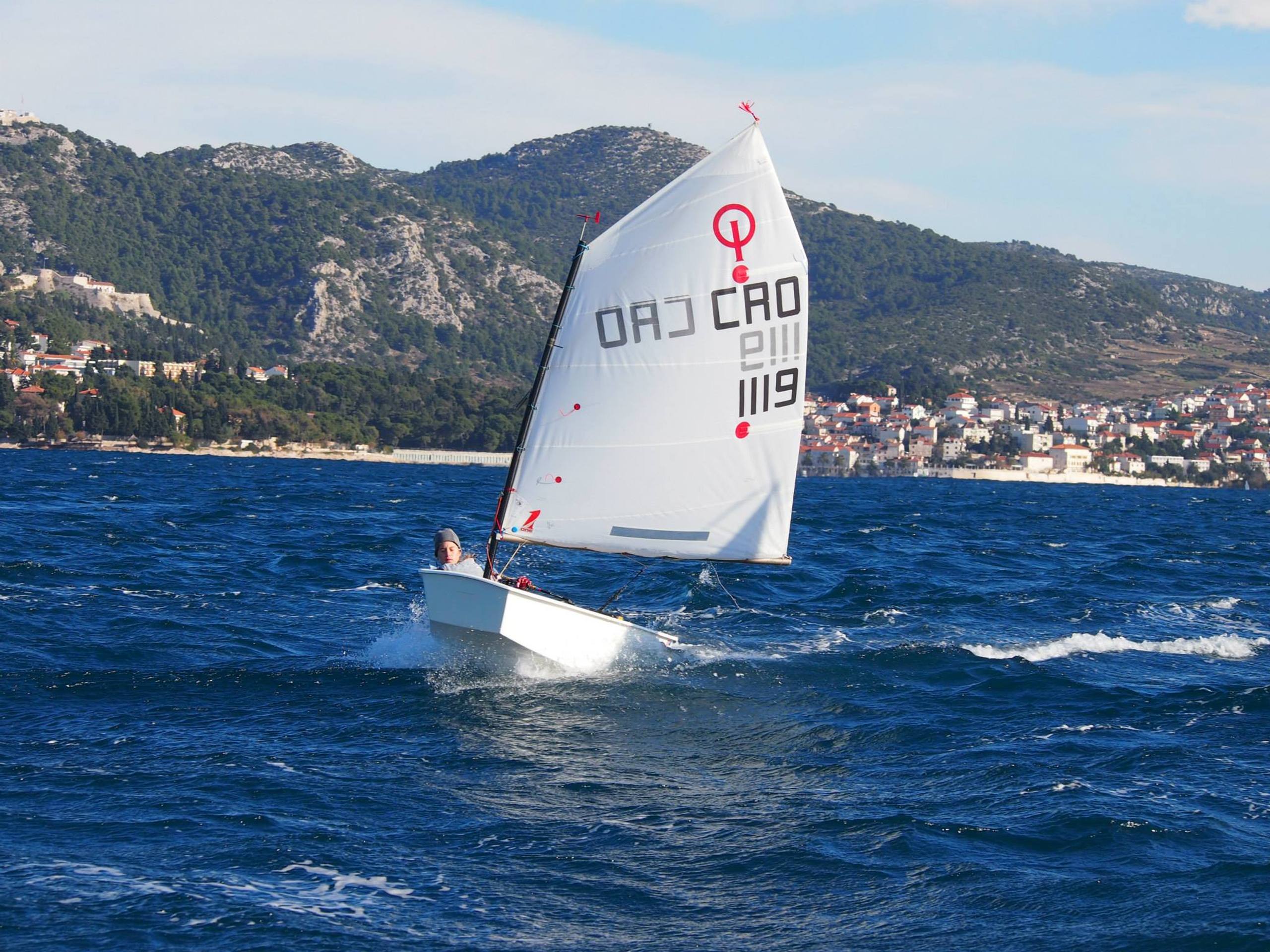 38. Međunarodna novogodišnja regata — Optimist, Hvar, prosinac 2014. — fotografija 56 od 57 (foto: Viktorija Nižetić)