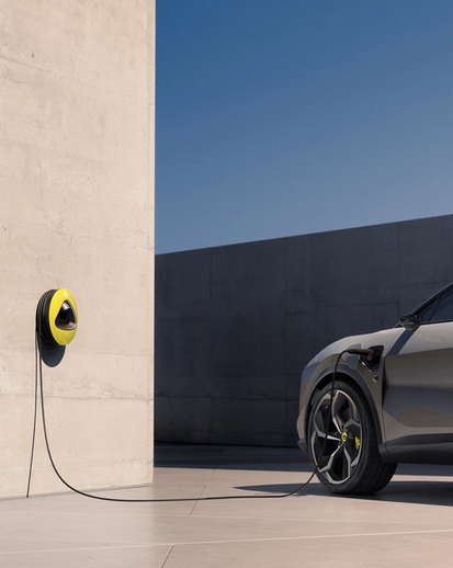 A Lotus electric vehicle being charged.