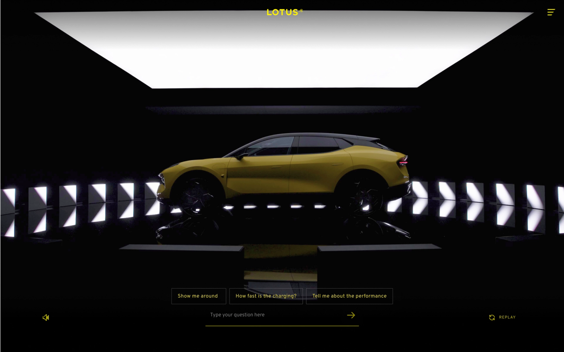 A Lotus electric vehicle in a modern and luxury showroom setting.