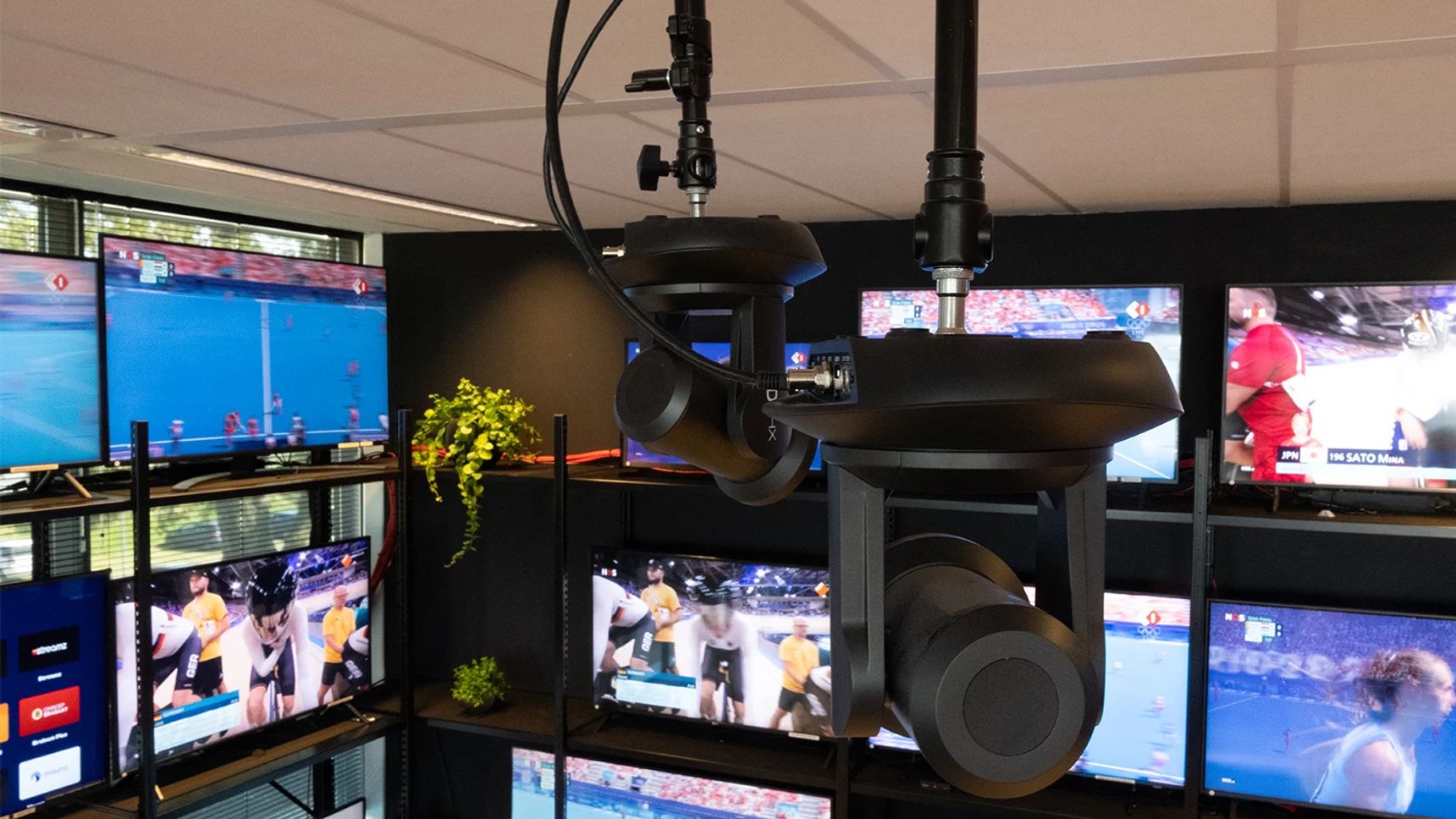 Webcams hanging from the ceiling, aimed on the smart TVs in Hypersolid's OTT test lab.