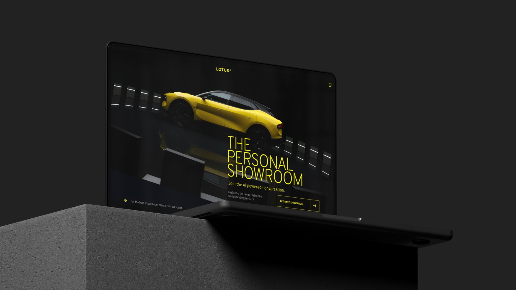 Opened laptop on a desk, displaying the Lotus Personal Showroom.