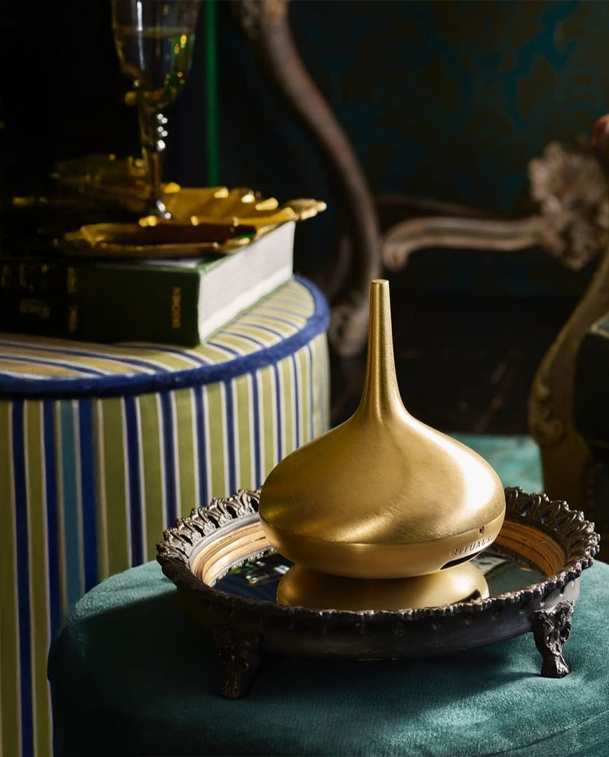 The Rituals Perfume Genie in a stylish living room setting.
