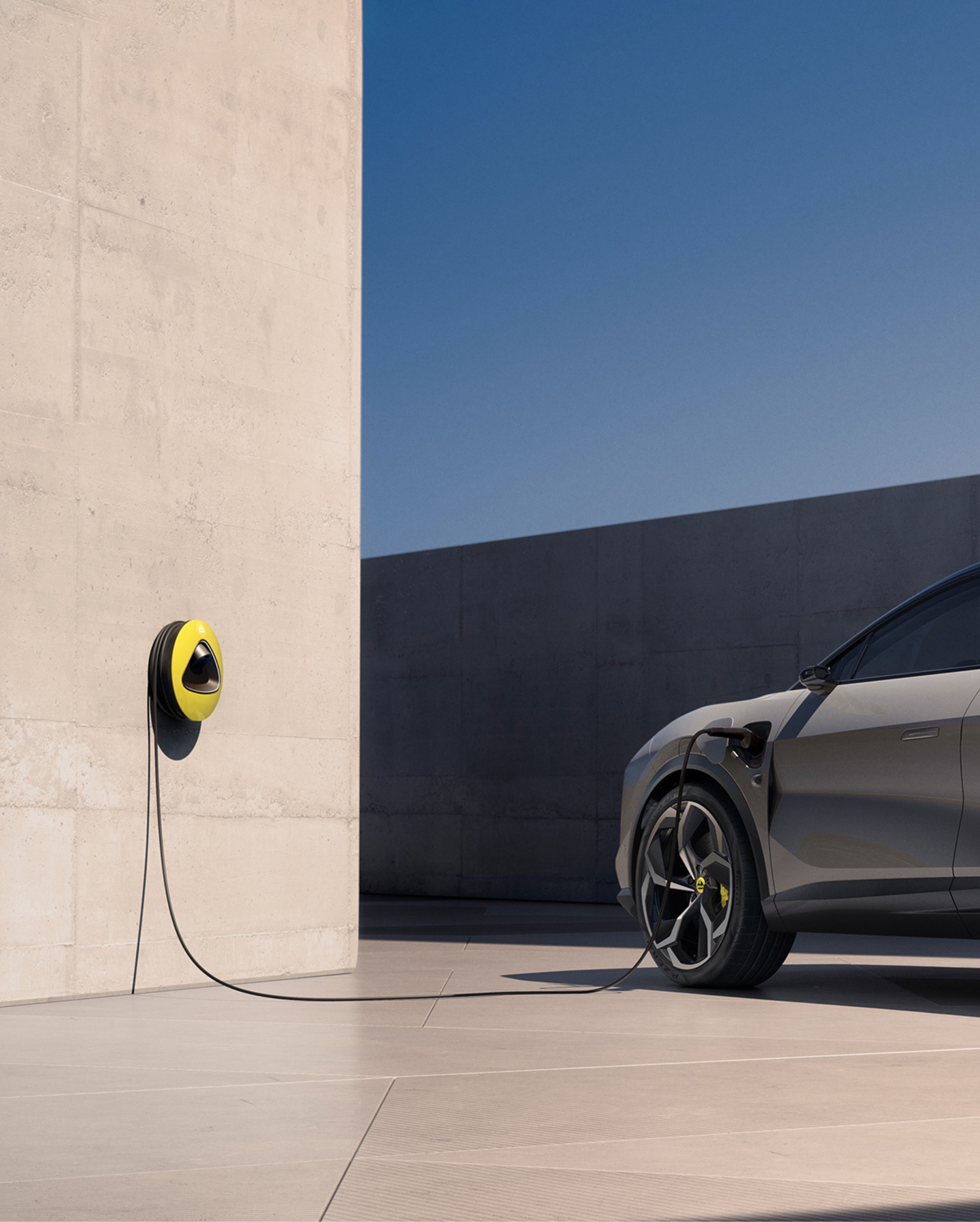 A Lotus electric vehicle being charged.