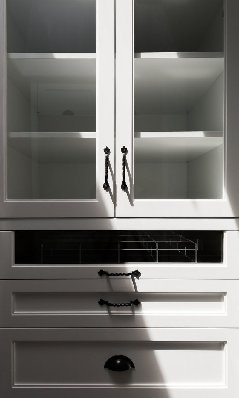 a closet with jewelry trays in natural light