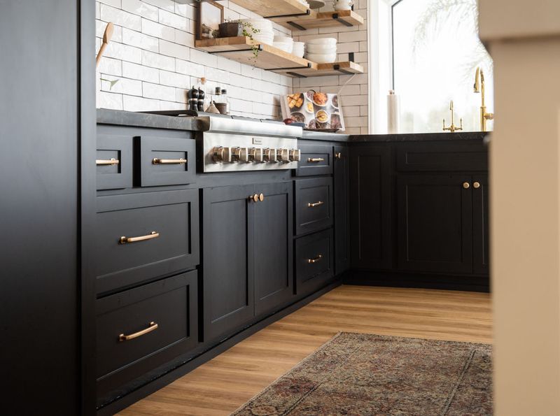 Black matte cabinets with gold handles