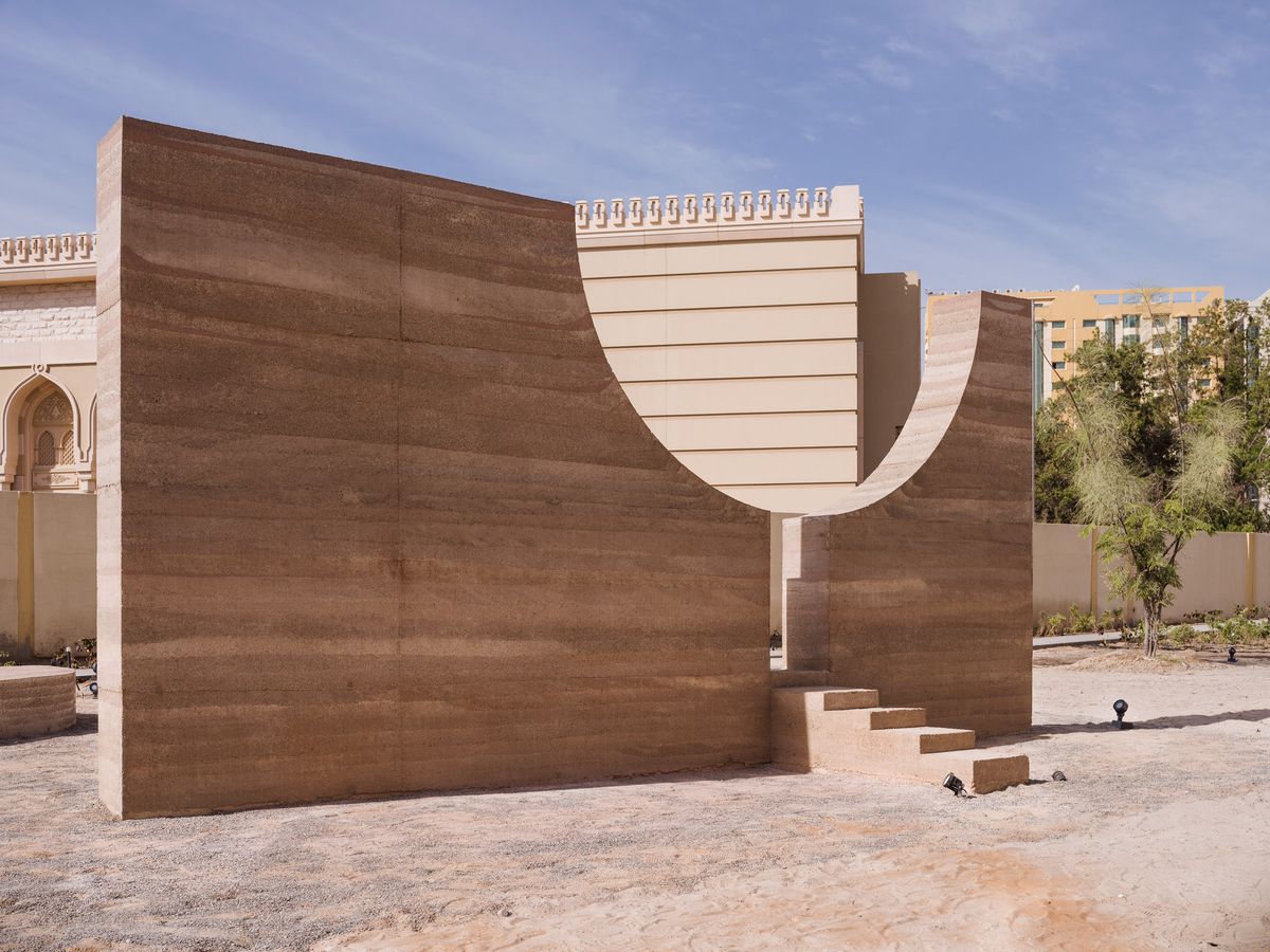 Eta'Dan by Hive Earth, rammed-earth installation at the Sharjah Architecture Triennial 2023.