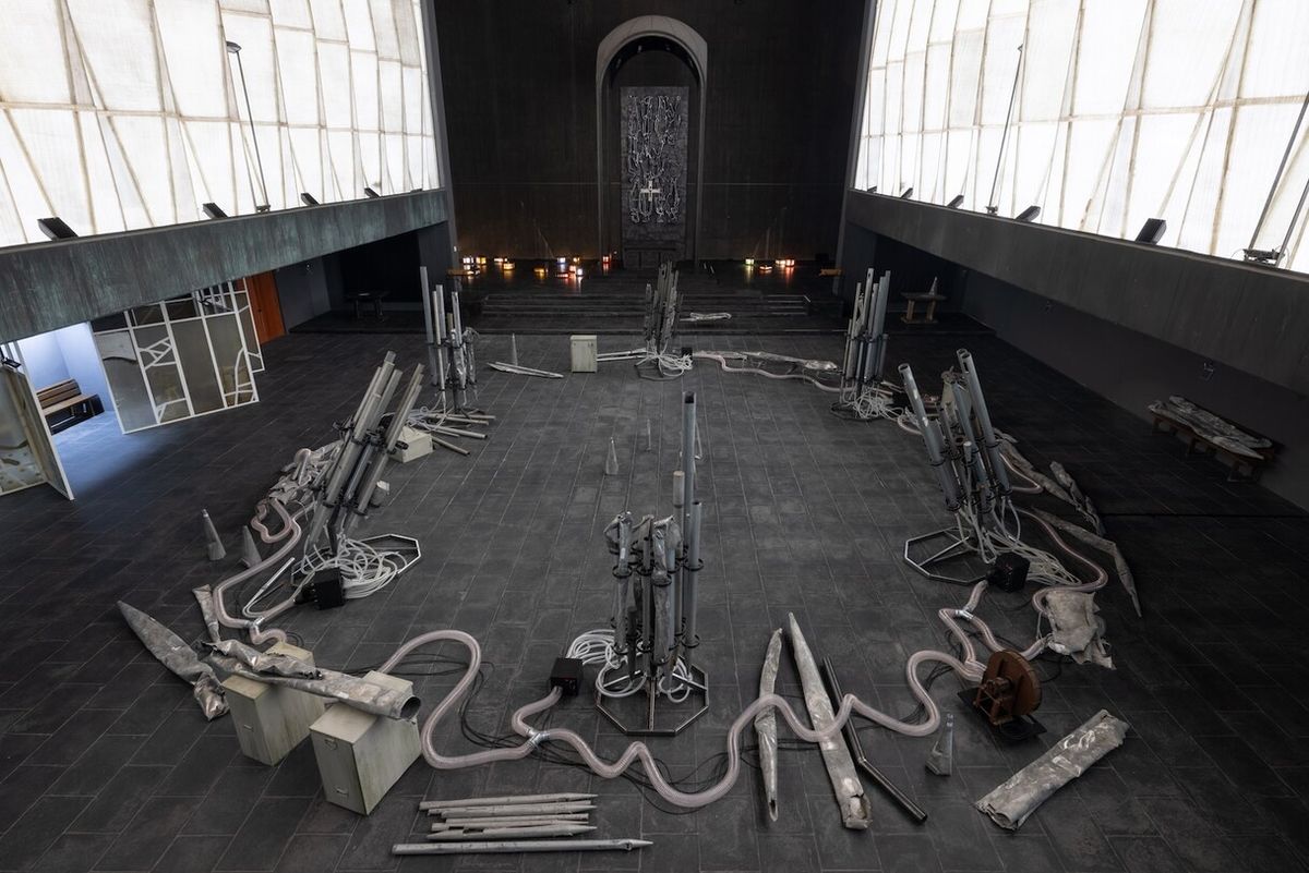 Salvaged organ pipes on stands inside the Kulturkirche Liebfrauen in Duisburg.