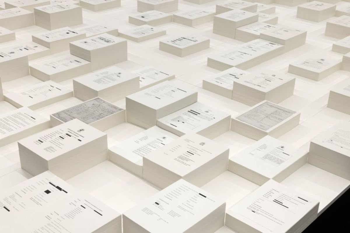 Central reflective pool surrounded by stacks of redacted coronial inquest documents at Archie Moore's kith and kin installation, Australian Pavilion, Venice Biennale 2024.
