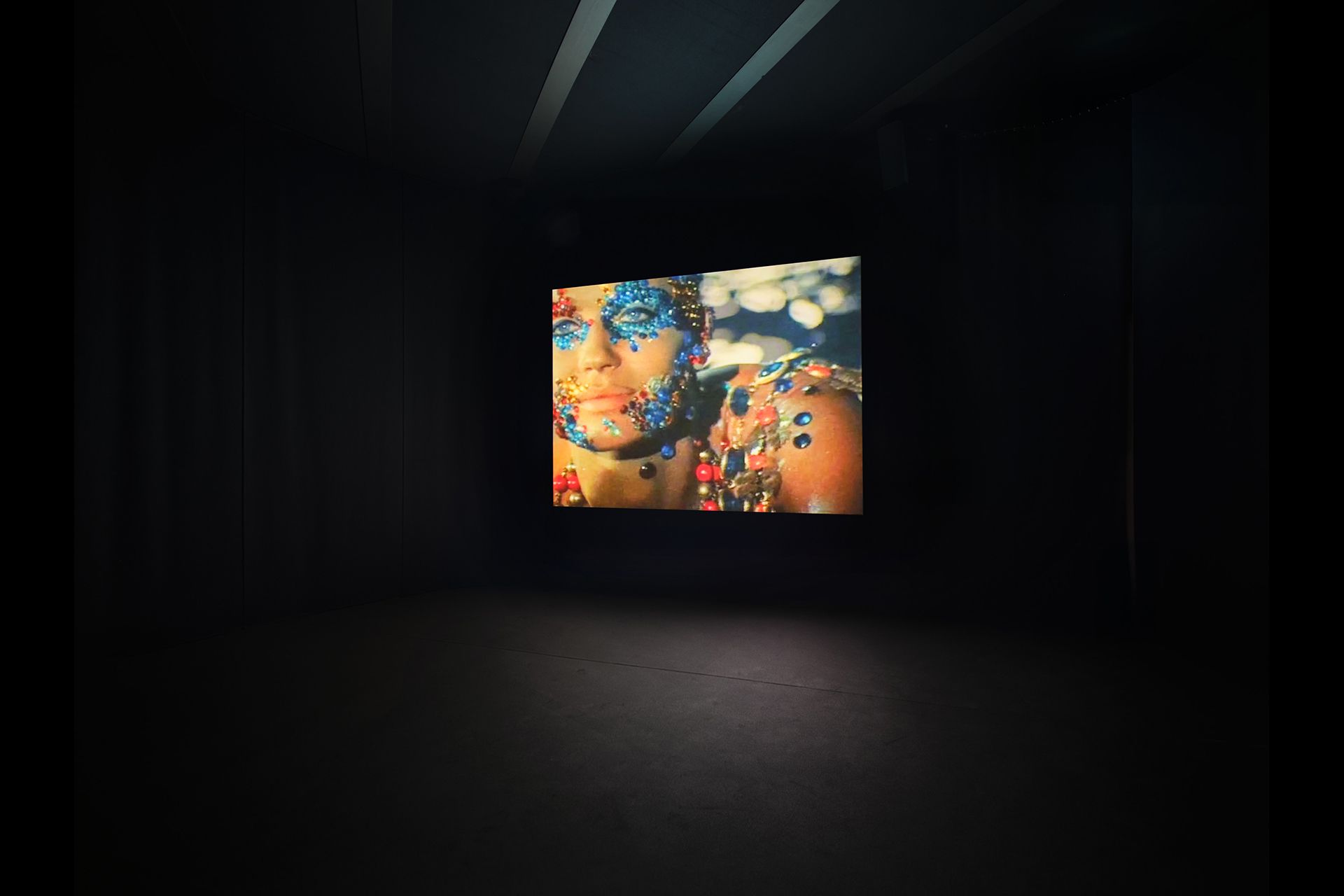 Screen from Nan Goldin's Sirens slideshow inside a dedicated pavilion at HangarBicocca.