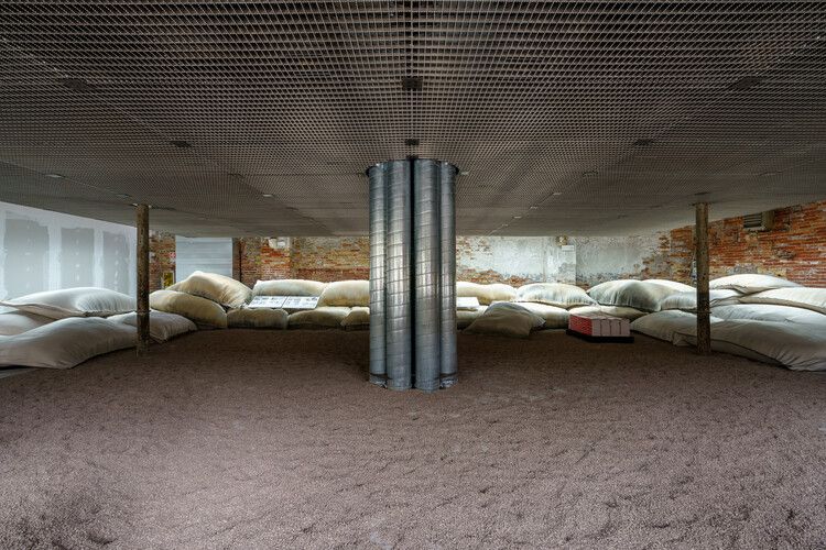 Interior of the Bahrain pavilion at the Venice Architecture Biennale 2025, cooled ceiling seen from below.