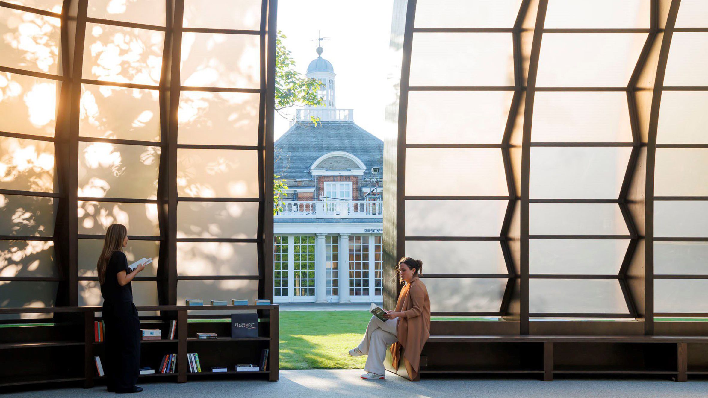 Marina Tabassum's 2025 Serpentine Pavilion 'A Capsule in Time', four arched timber capsule volumes with translucent skin, Kensington Gardens.