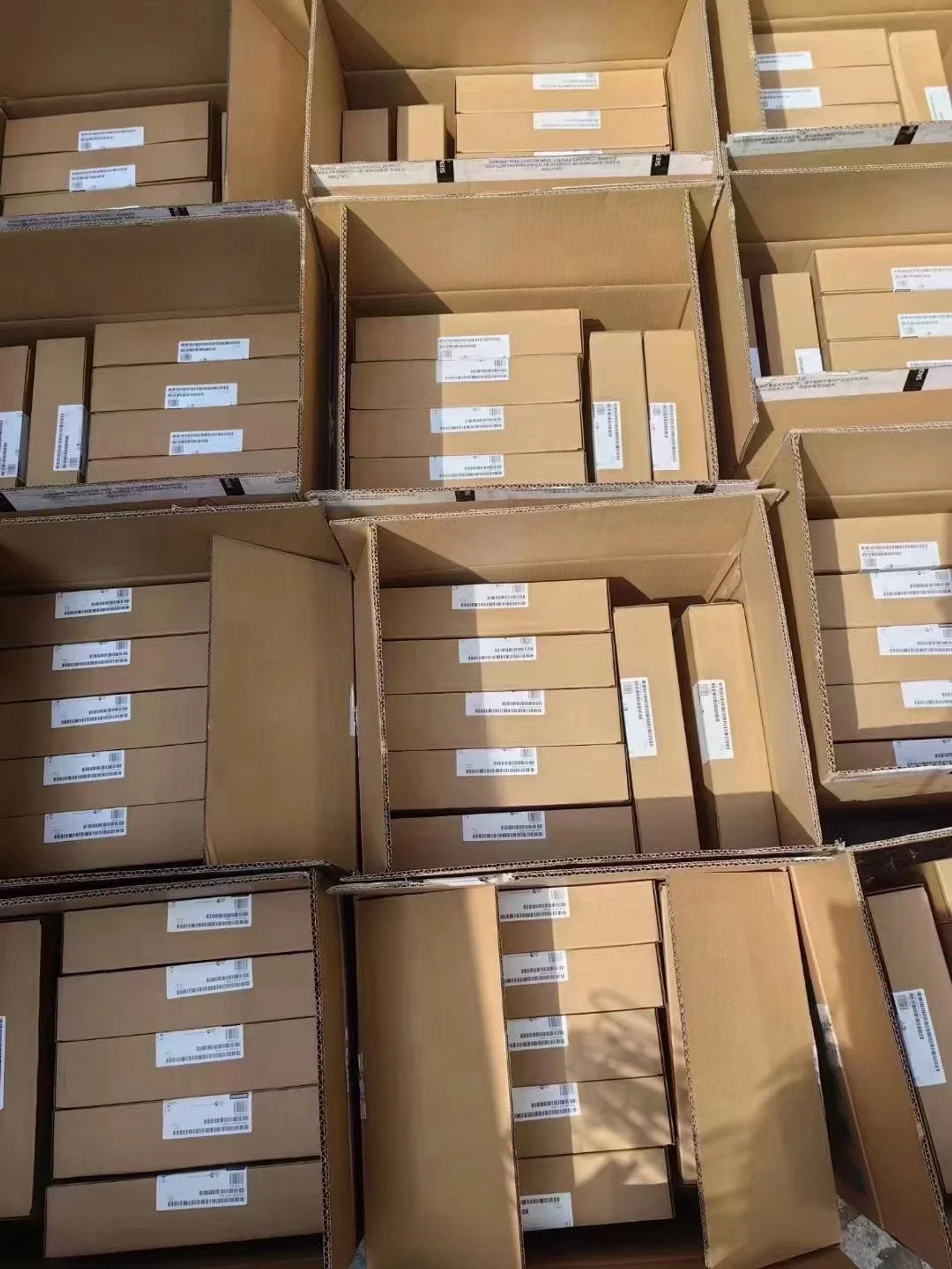 Boxed industrial automation components prepared in inventory