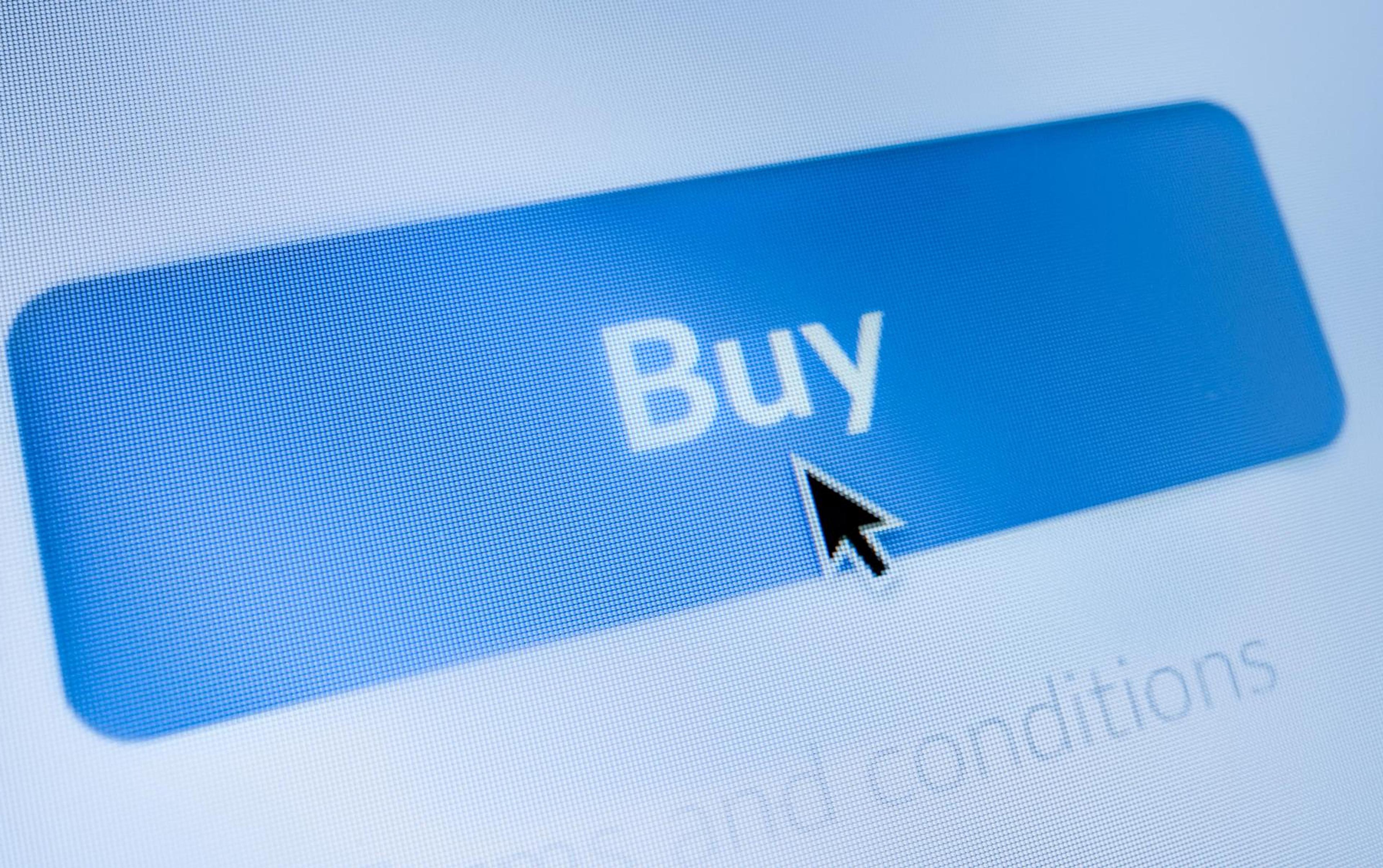 Close-up of a blue "Buy" button on a screen with a cursor