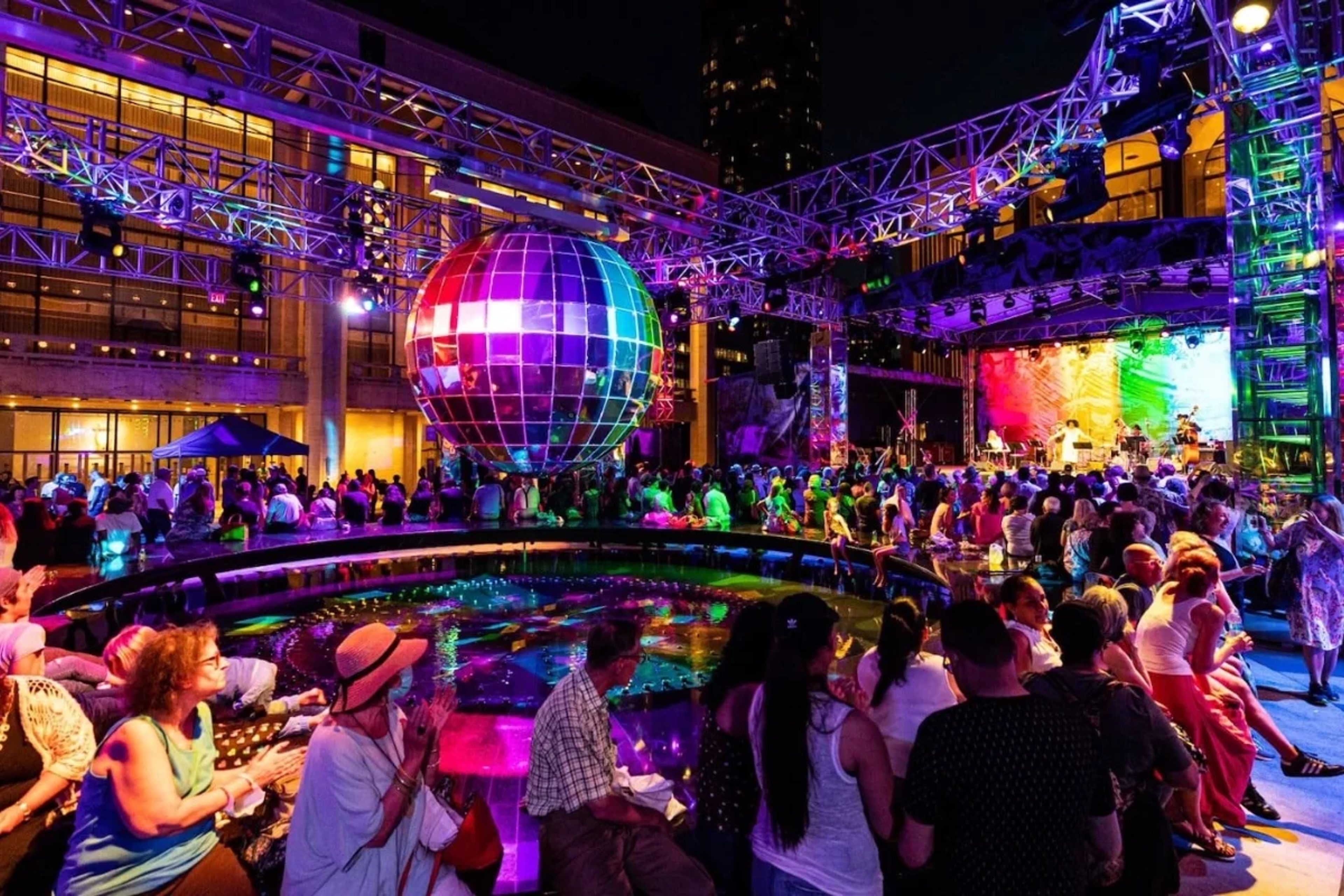 Event at Lincoln Center at night with bright lights