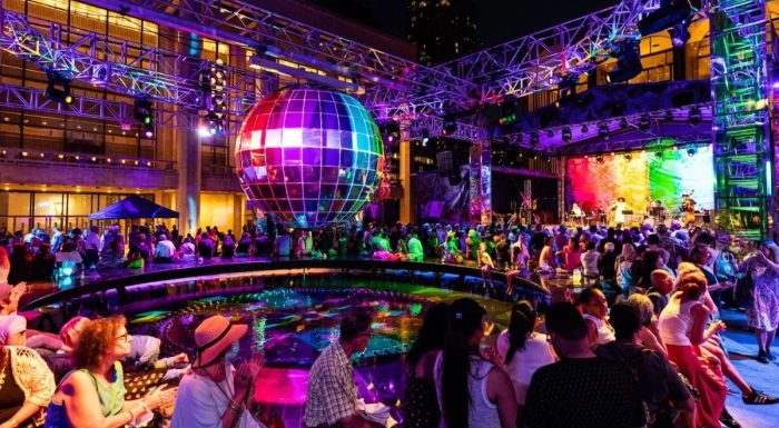 Event at Lincoln Center at night with bright lights