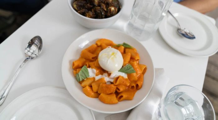 Restaurant table with pasta dish