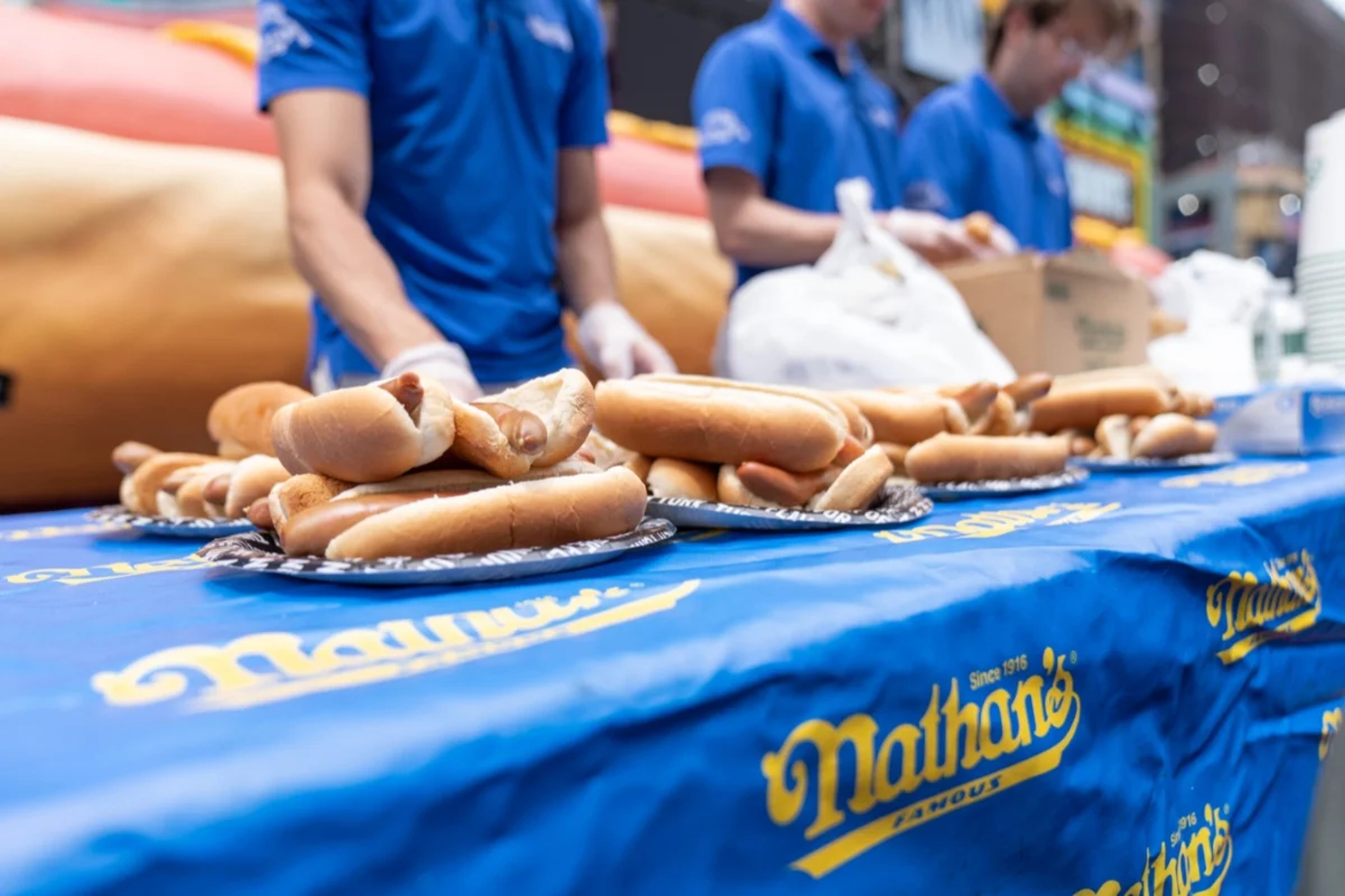 Table with hot dogs for the 4th of July hot dog eating contest