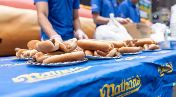 Table with hot dogs for the 4th of July hot dog eating contest