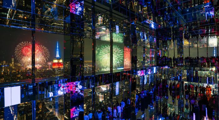 Mirrored room at SUMMIT One Vanderbilt with fireworks in the background