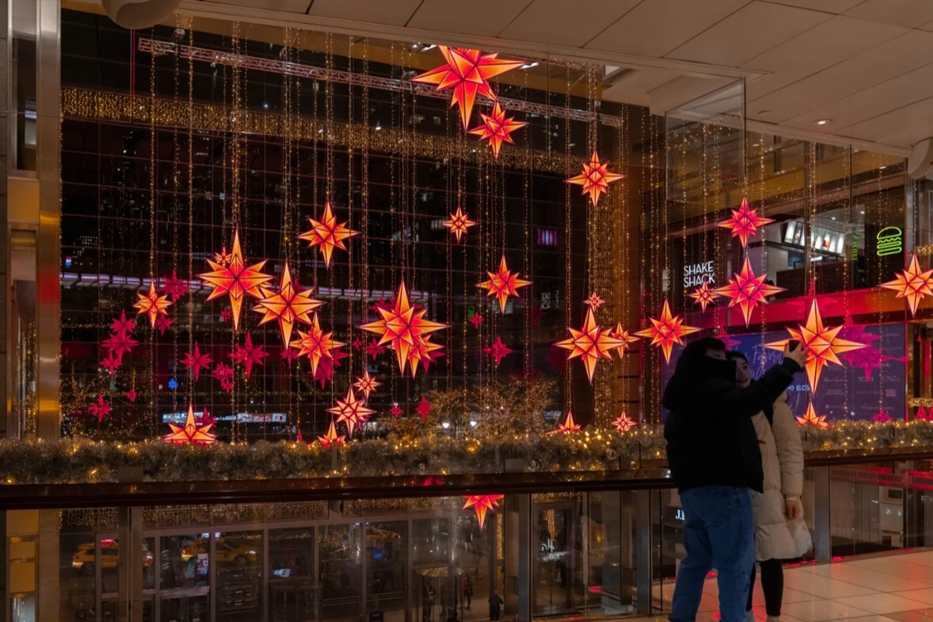 Illuminated stars inside the Shops at Columbus Circle