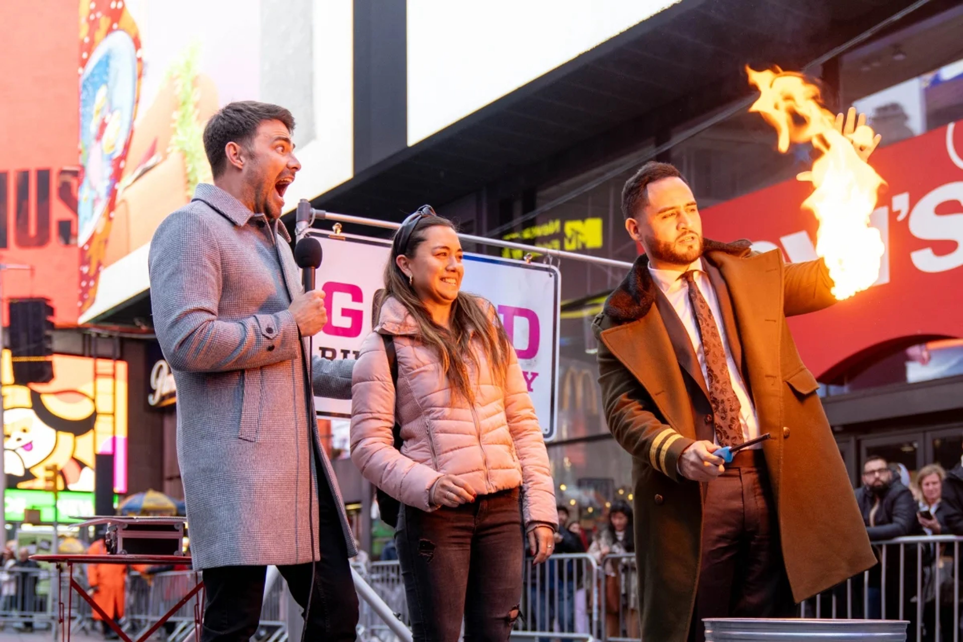 A piece of paper is being burnt in Times Square