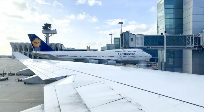 Airport with a Lufthansa 747 aircraft parked