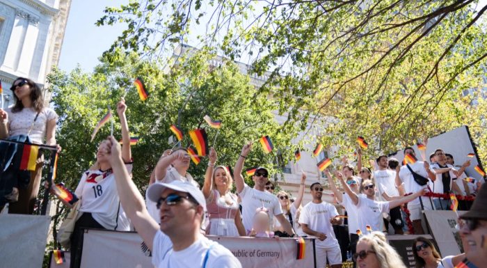 Steuben Parade Float of the German Consulate with people waving flags