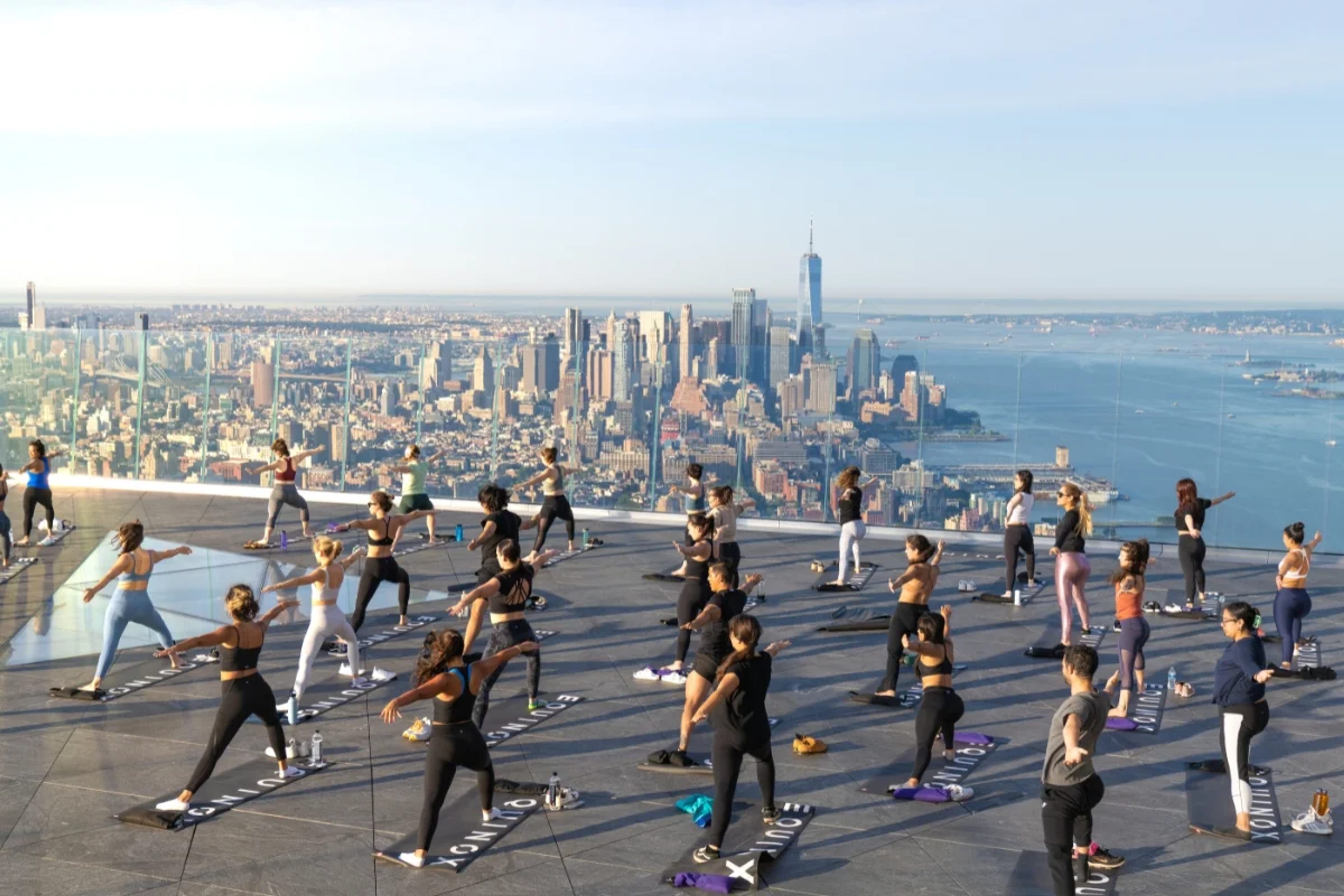 Yoga class on the Edge observation deck with views of New York