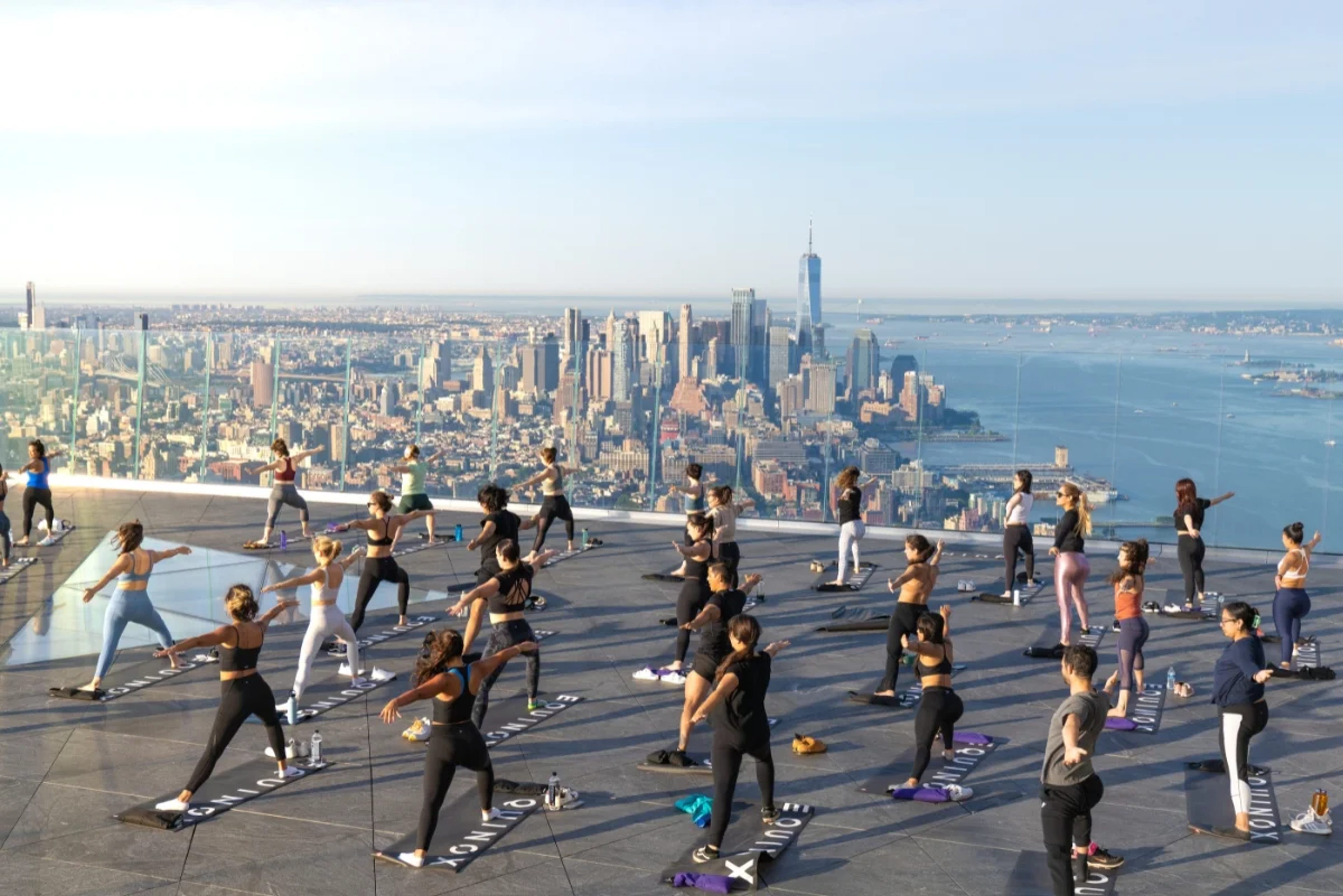 Yoga class on the Edge observation deck with views of New York