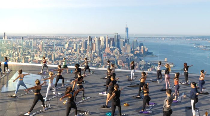 Yoga class on the Edge observation deck with views of New York