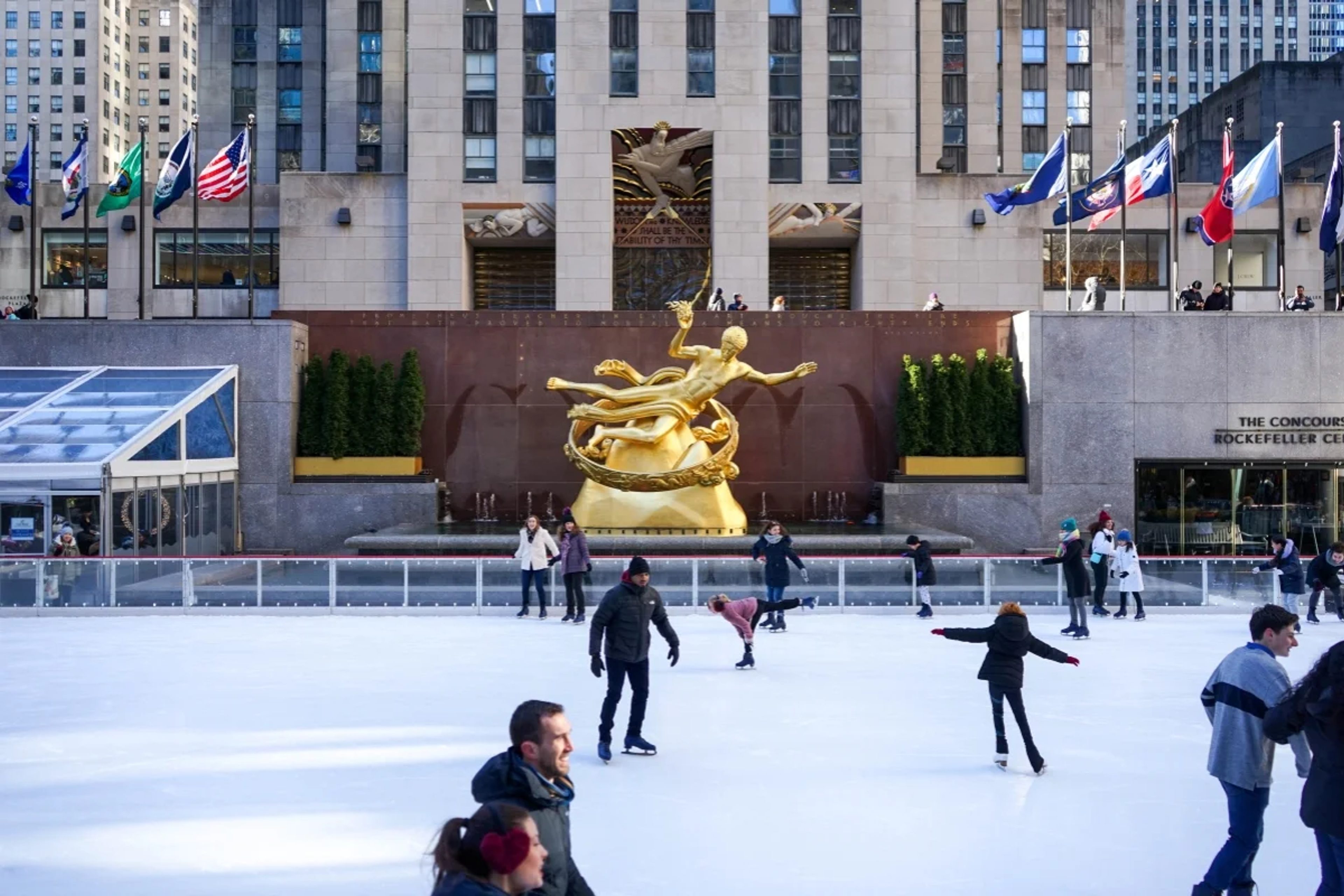 People ice skating on the Rink at Rockefeller Center