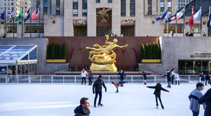 People ice skating on the Rink at Rockefeller Center