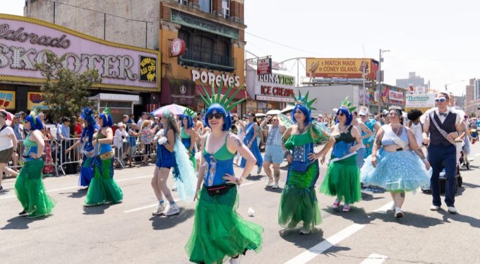 Mermaid Parade participants dressed as the Statue of Liberty on Coney Island