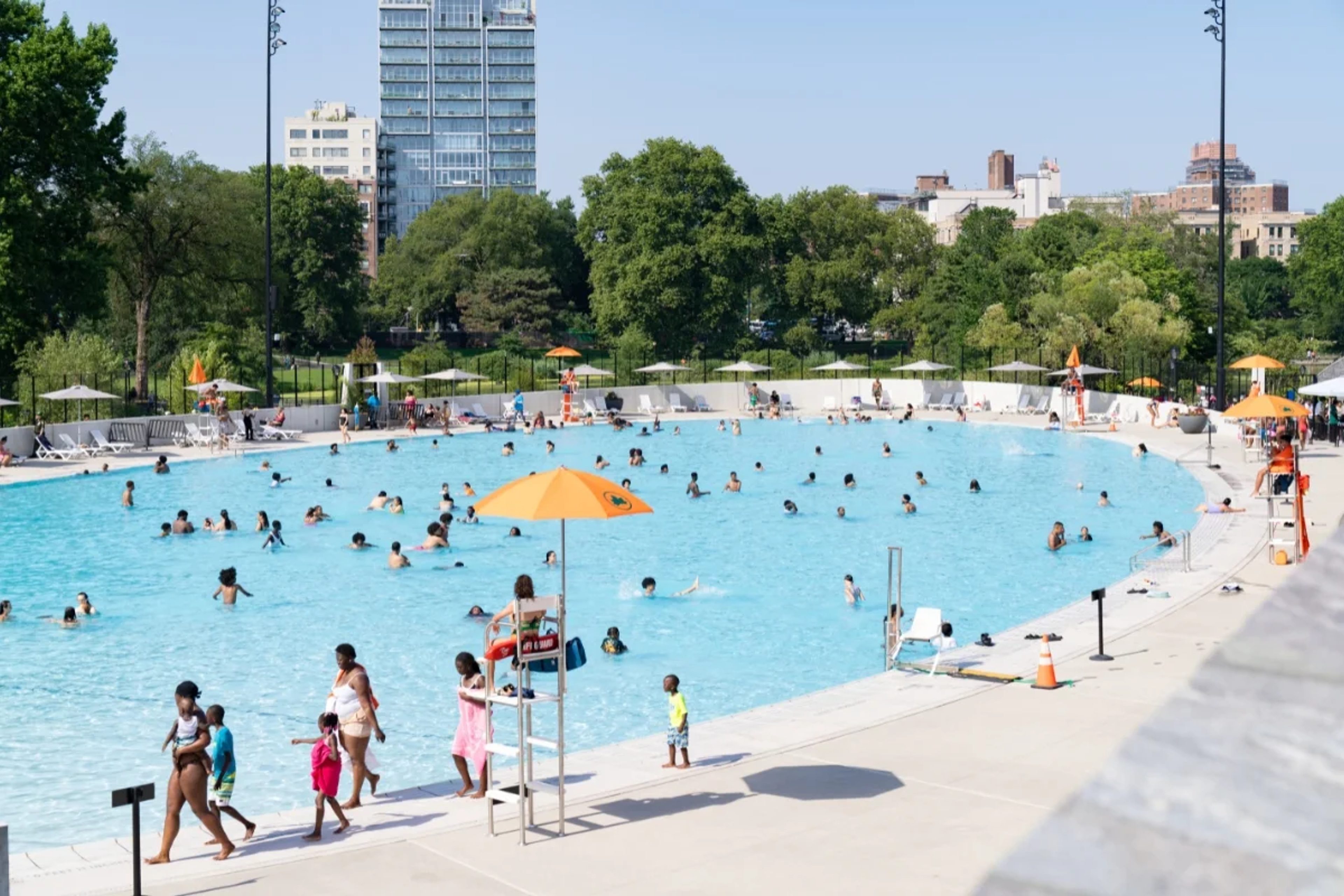Visitors bathing in the Davis Center Pool in Central Park