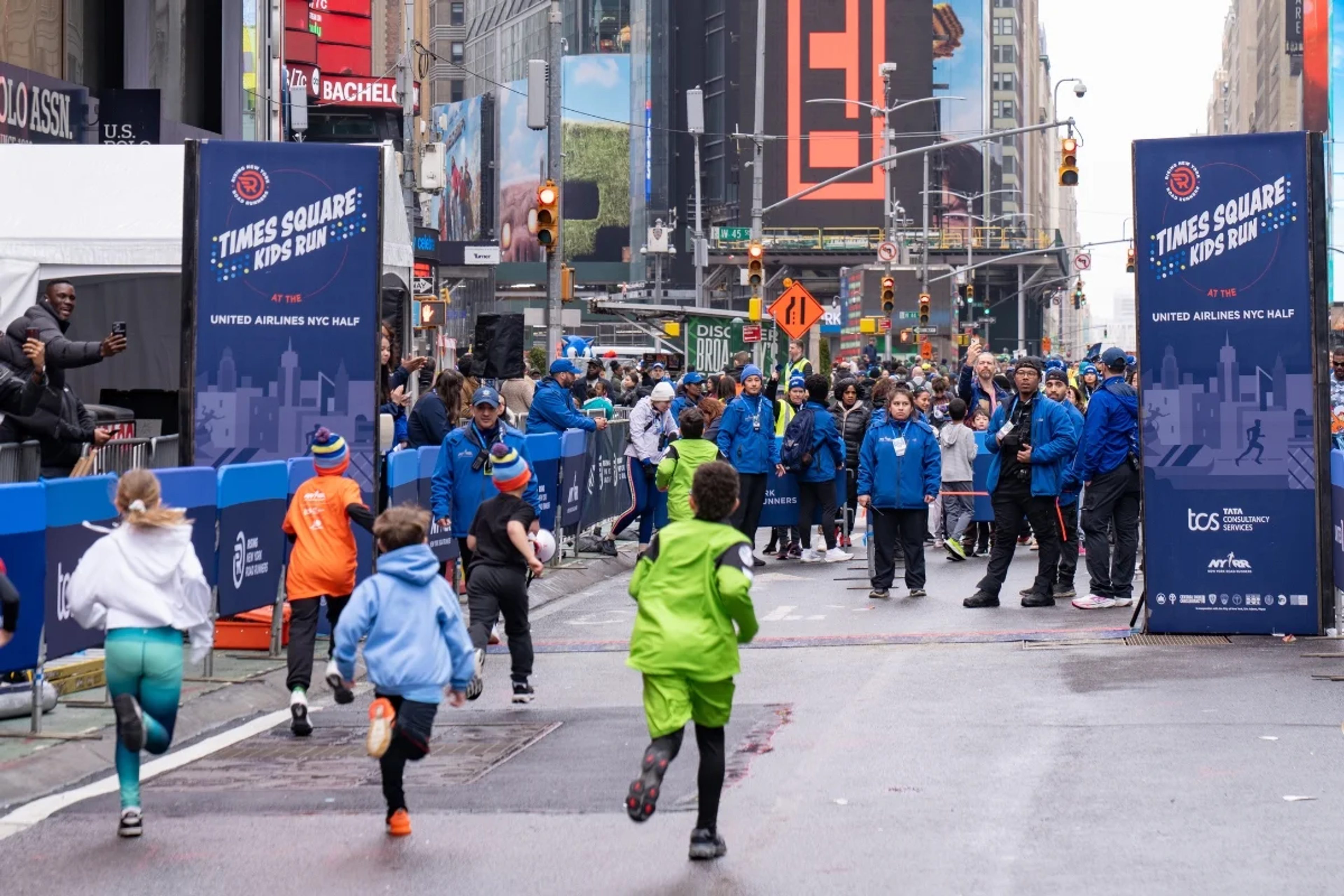 Kids run in Times Square