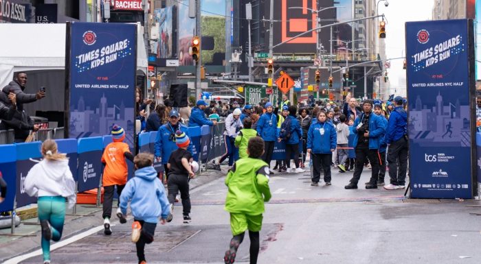 Kids run in Times Square