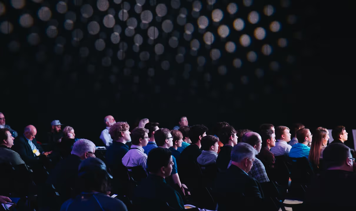 Rocket on a launch pad ready for liftoff against a cloudy sky