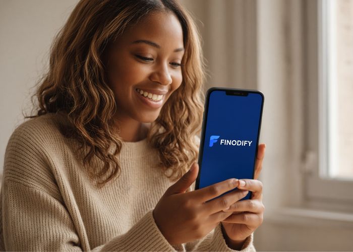 Phone screen showing the Finodify app with a personalized monthly money story and spending breakdown