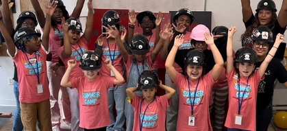 A group of ten girls attending the Brooklyn summer camp session of Tools & Tiaras Inc.