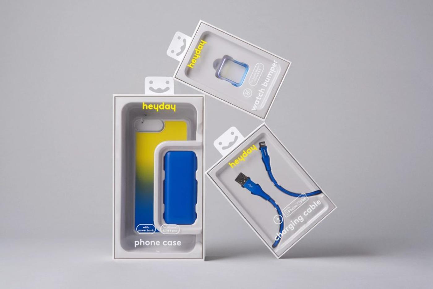 Heyday packaging for a phone case, watch bumper and charging cable, in blue and yellow