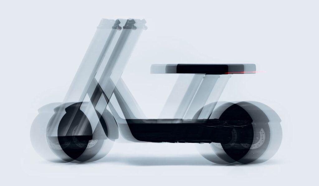 A multiple-exposure render of the Olto scooter, its frame ghosted through the motion