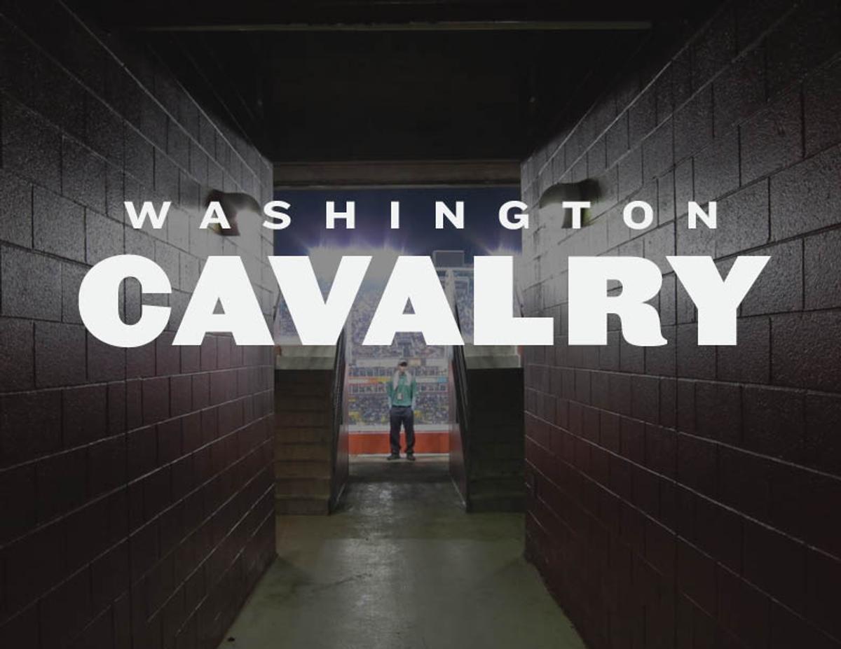 "Washington Cavalry" set over a darkened stadium tunnel leading out to the stands.