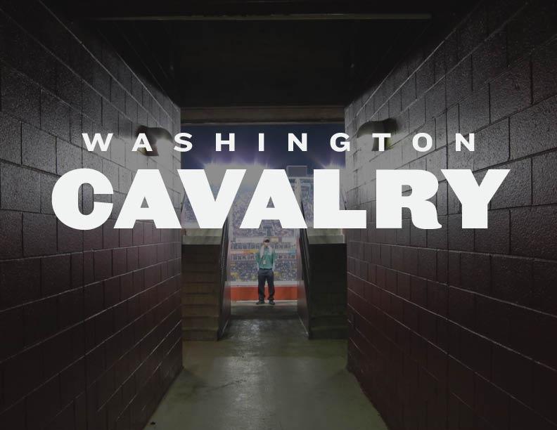 "Washington Cavalry" set over a darkened stadium tunnel leading out to the stands.