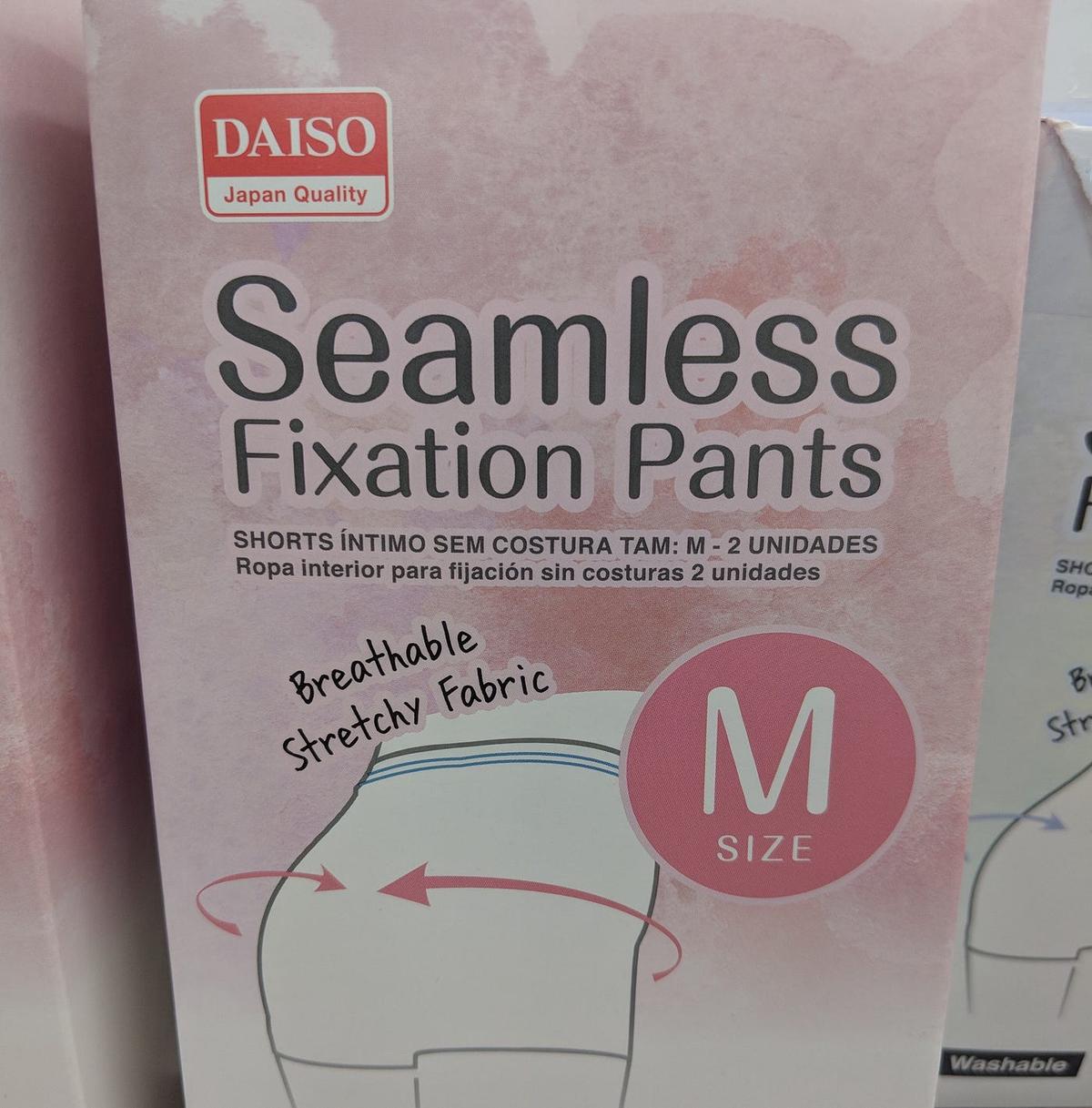 A pink Daiso box labeled "Seamless Fixation Pants," size M, "Breathable Stretchy Fabric."