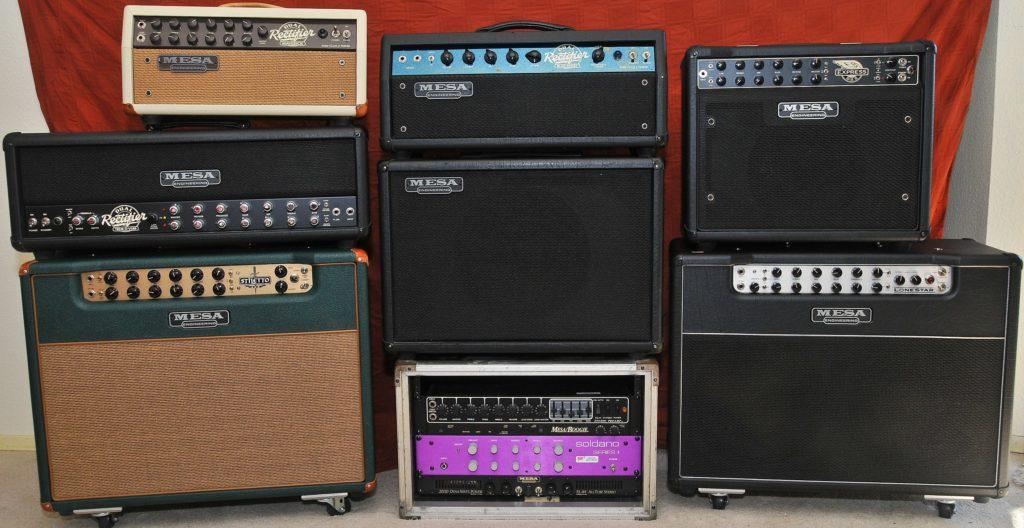 A wall of stacked Mesa Boogie guitar amps, heads and cabinets, each badged "Mesa Engineering."